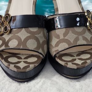 Coach woman's size 9B platform wedge with peep toe.